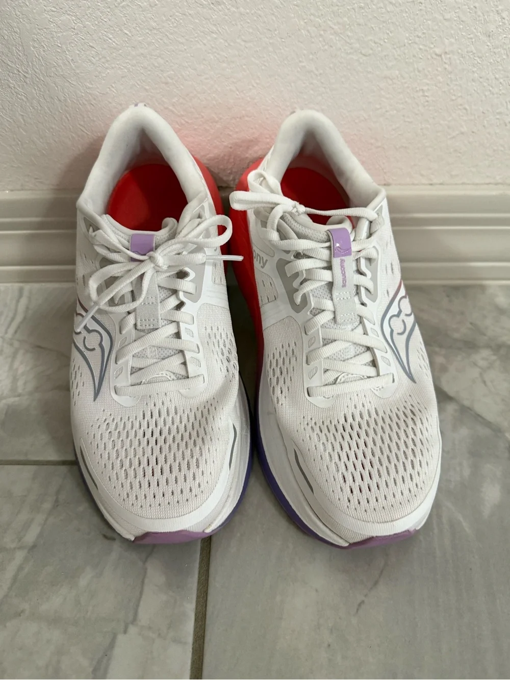 Saucony Guide 18 is a aWhite Running Shoes with Coral and Lavender Accents